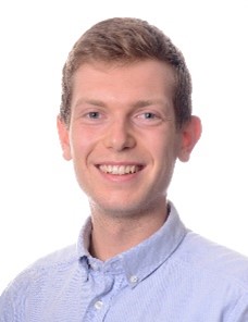 A person smiling for the picture with low confidence