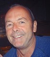 A person smiling for the camera with medium confidence